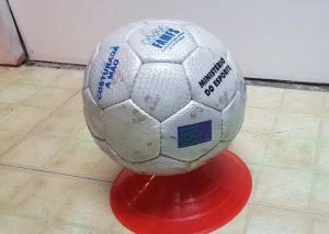 Soccer ball on small cone to hold it stationary